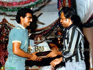 Receving a momento from Rajani Kanth at 100days function of Terror